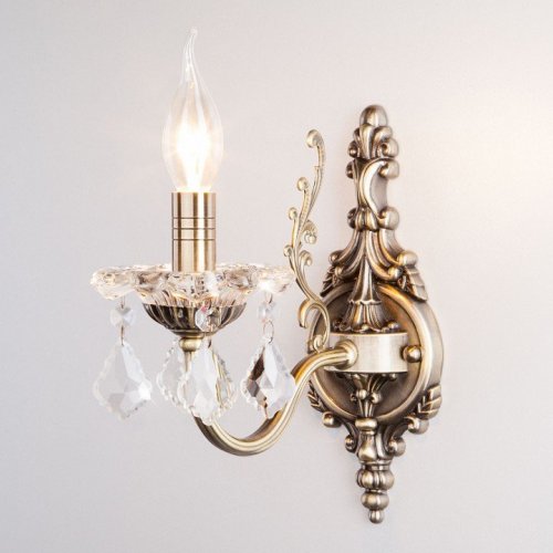 Бра Eurosvet 3281/1 античная бронза/прозрачный хрусталь Strotskis Бра Eurosvet 3281/1 античная бронза/прозрачный хрусталь Strotskis