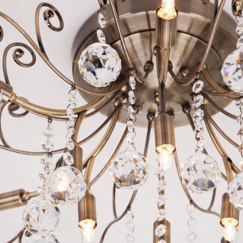 Потолочная люстра Eurosvet 10042/12 античная бронза/прозрачный хрусталь Потолочная люстра Eurosvet 10042/12 античная бронза/прозрачный хрусталь